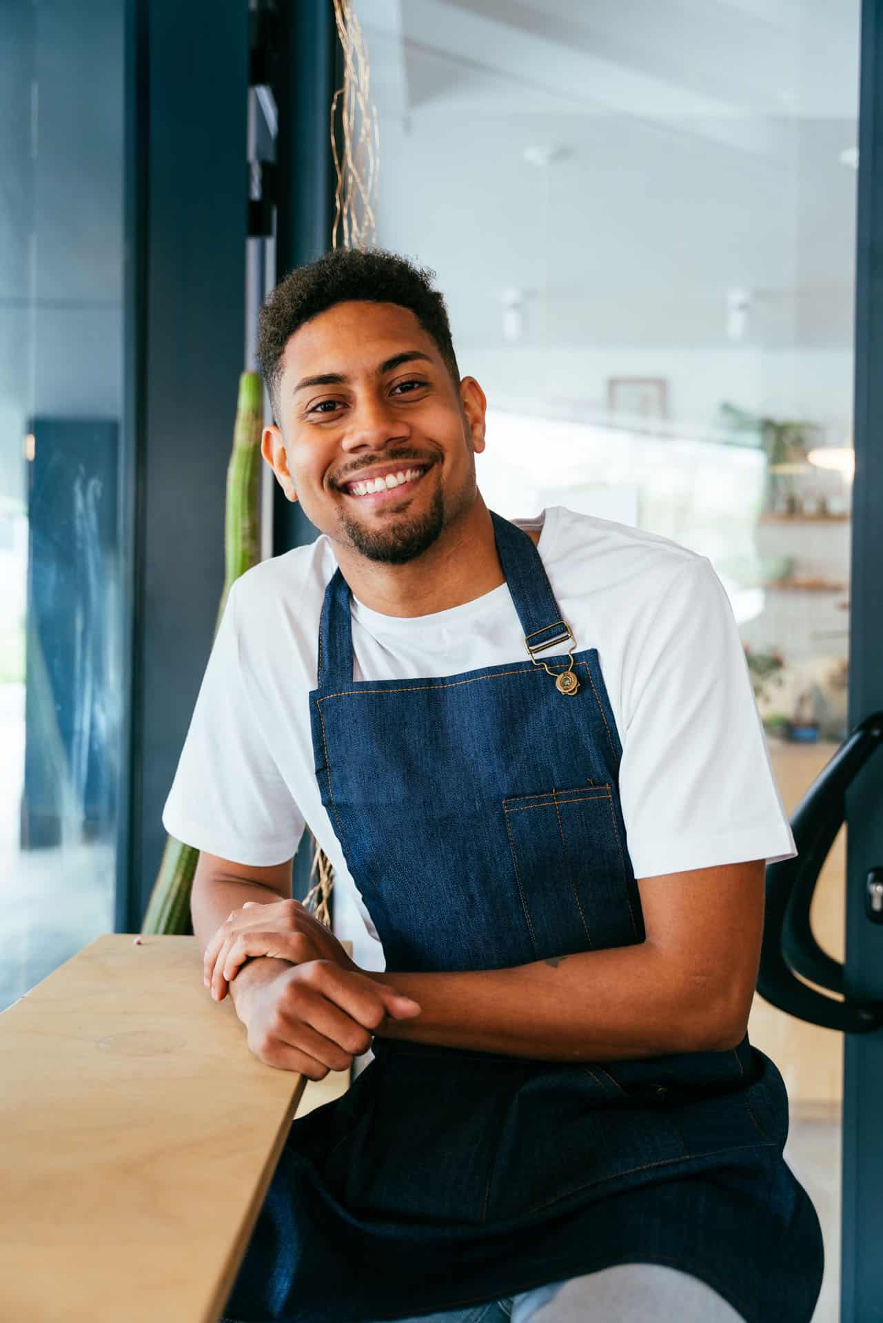 International student working part-time as a barista while studying in Australia.